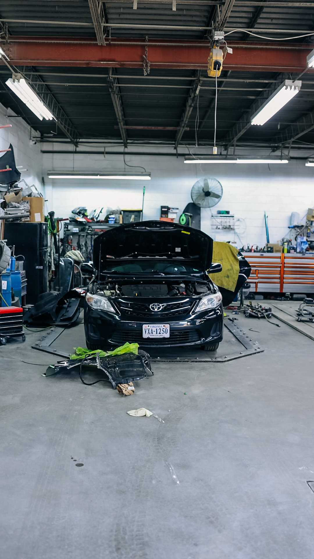 Vehicles on shop floor at Quality Auto Body